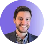 scott-headshot A smiling man with short brown hair and a beard, wearing a dark blazer over a checkered shirt, is pictured in front of a purple gradient background, embodying the confidence that comes from effective coaching.
