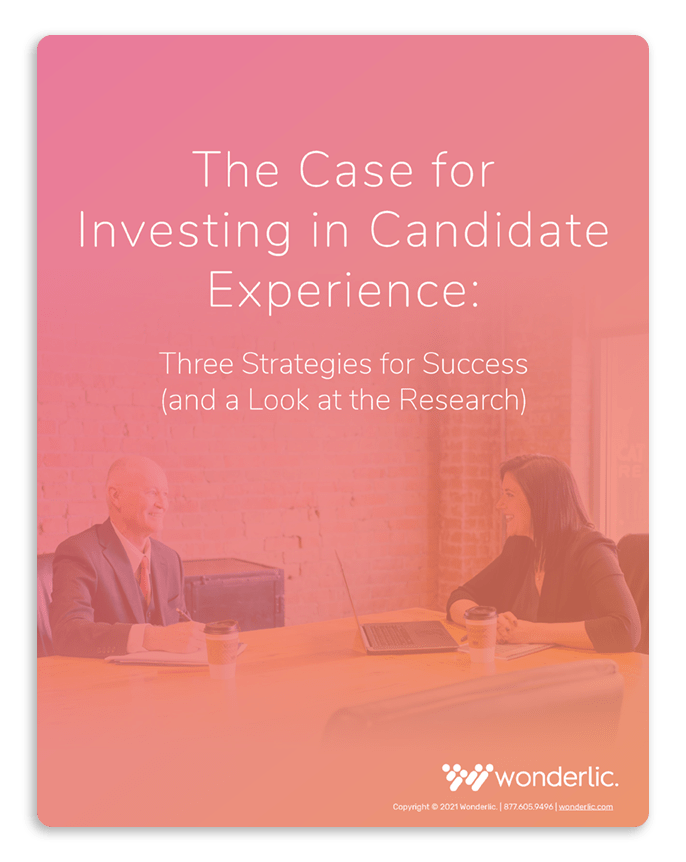 A promotional image for "The Case for Investing in Candidate Experience," highlighting "Three Strategies for Success (and a Look at the Research)." A man and woman sit across from each other, engaged in conversation in an office setting.